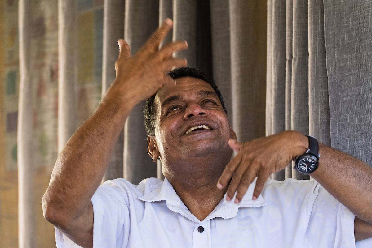 A Deaf pastor preaches to his congregation.